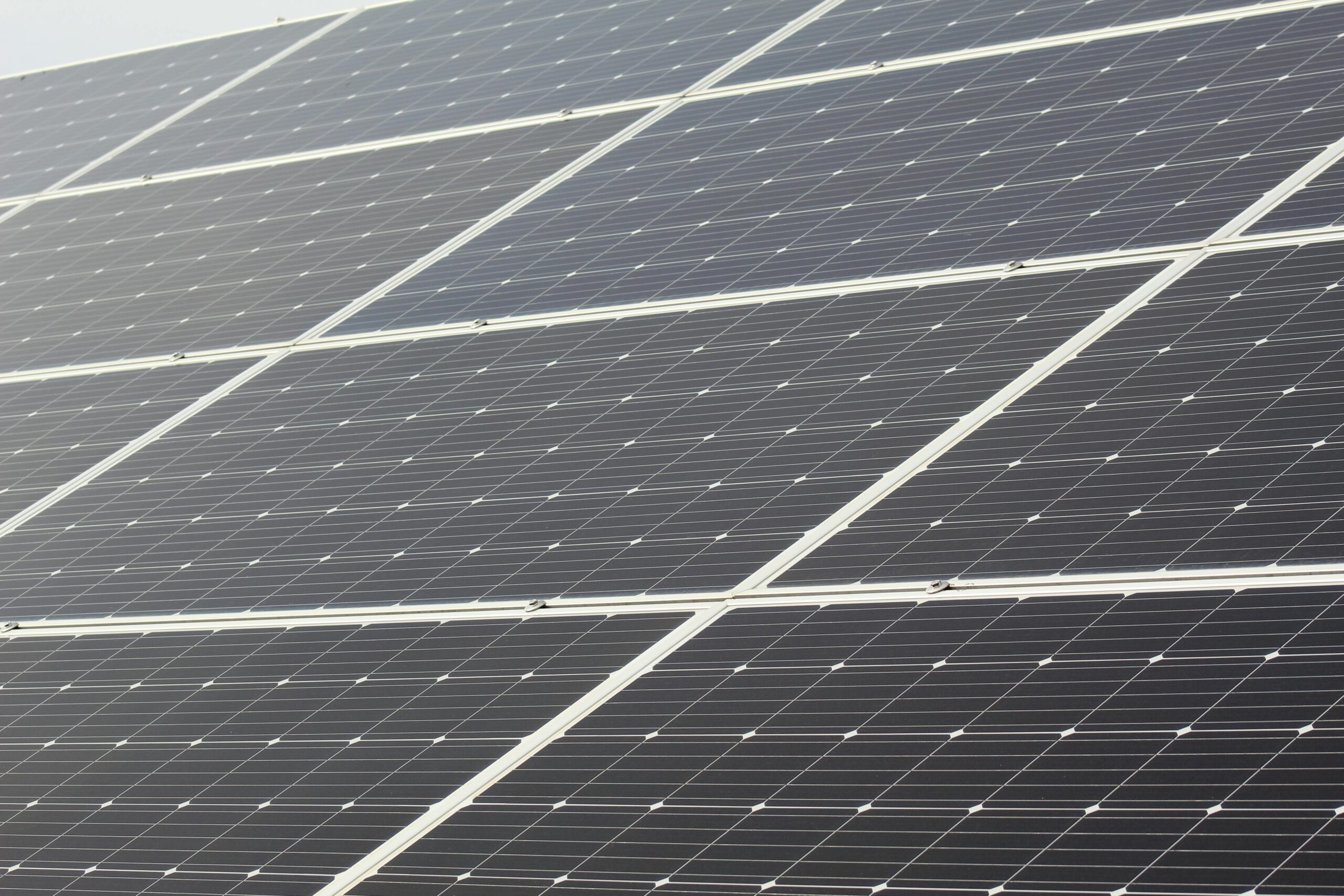 Detailed close-up of solar panels harnessing sunlight for sustainable energy generation.